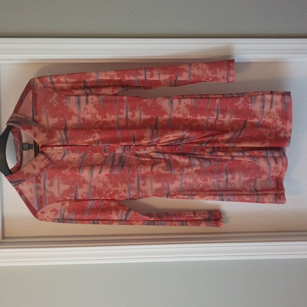 A Woman's XL Long Sleeve Mesh Below The Hips Top